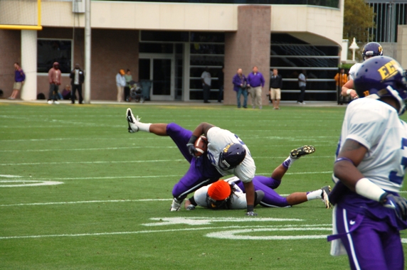  - 042013-04_michael-dobson-brings-down-lee-pegues-after-a-fake-punt-picked-up-a-1st-down_572x380