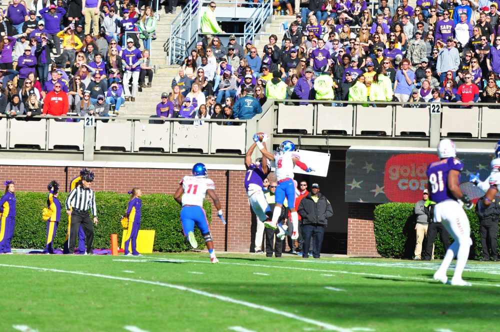 Zay Jones makes a leaping touchdown catch as time expires in the first half. (Bonesville Staff photo)