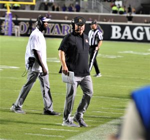 First-year East Carolina coach Mike Houston had a short week before the Temple game. The Pirates don't play again until Oct.19 at Central Florida. (Photo by Al Myatt)