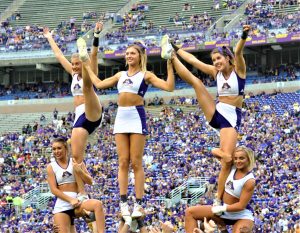 The ECU cheerleaders get up to lift the spirits of Pirate Nation on Saturday. (Photo by Al Myatt)