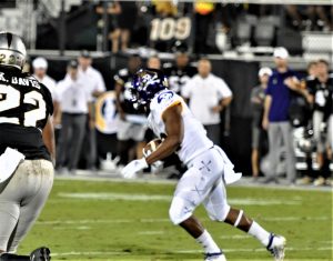 Trace Christian gets yards for ECU after catching a pass on Saturday night at UCF (Al Myatt photo)