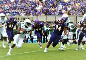 USF quarterback Jordan McCloud's gain on this play was nullified by holding. (Photo by Al Myatt)