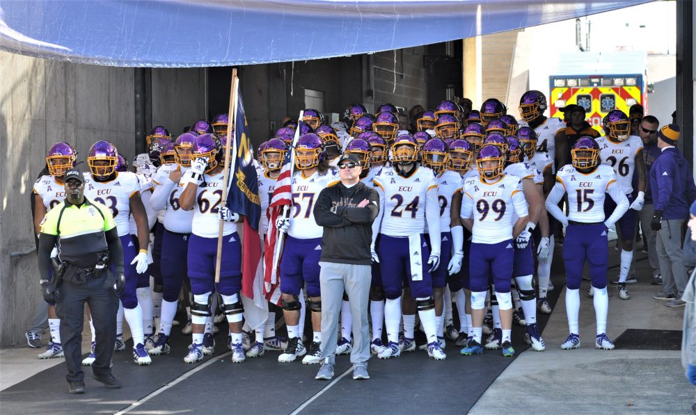 ECU coach Mike Houston and the Pirates wait in the tunnel to take the field at Connecticut. (Photo by Al Myatt.)