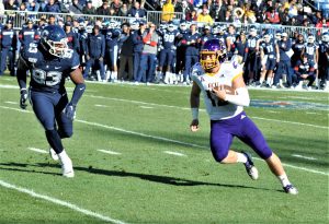 Sophomore quarterback Holton Ahlers runs the ball on Saturday for East Carolina. (Photo by Al Myatt)