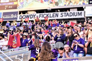 The student section, the Boneyard, is energized with the Pirates driving on the East end of Dowdy-Ficklen Stadium. (Al Myatt photo)